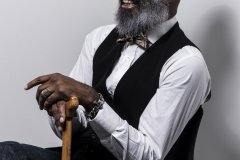 Jessica_Moh_Tony_Ward_Studio_Fashion_Photography_Kevin_Stewart_Kay_Davis_Male_Model_Laughing_Sitting_Bowler_Hat_Cane_Old_School_Shirt_Makers_Bowtie