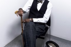Jessica_Moh_Tony_Ward_Studio_Fashion_Photography_Kevin_Stewart_Kay_Davis_Male_Model_Sitting_Bowler_Hat_Cane_Old_School_Shirt_Makers_Bowtie_Hat_On_The_Ground