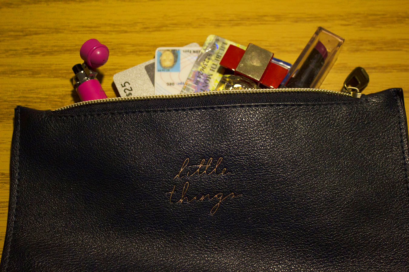 Tony_Ward_Studio_assignment_photographer_Lilibeth_Montero_purse_items_zipper_purses